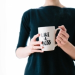 Salesperson Holding Coffee Mug
