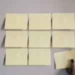 Sales Prospecting Tips being listed on sticky notes