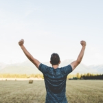 Man with hands in the air due to making the Inc 5000 list