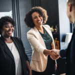 Photo of two sales people sharing Sales Tips